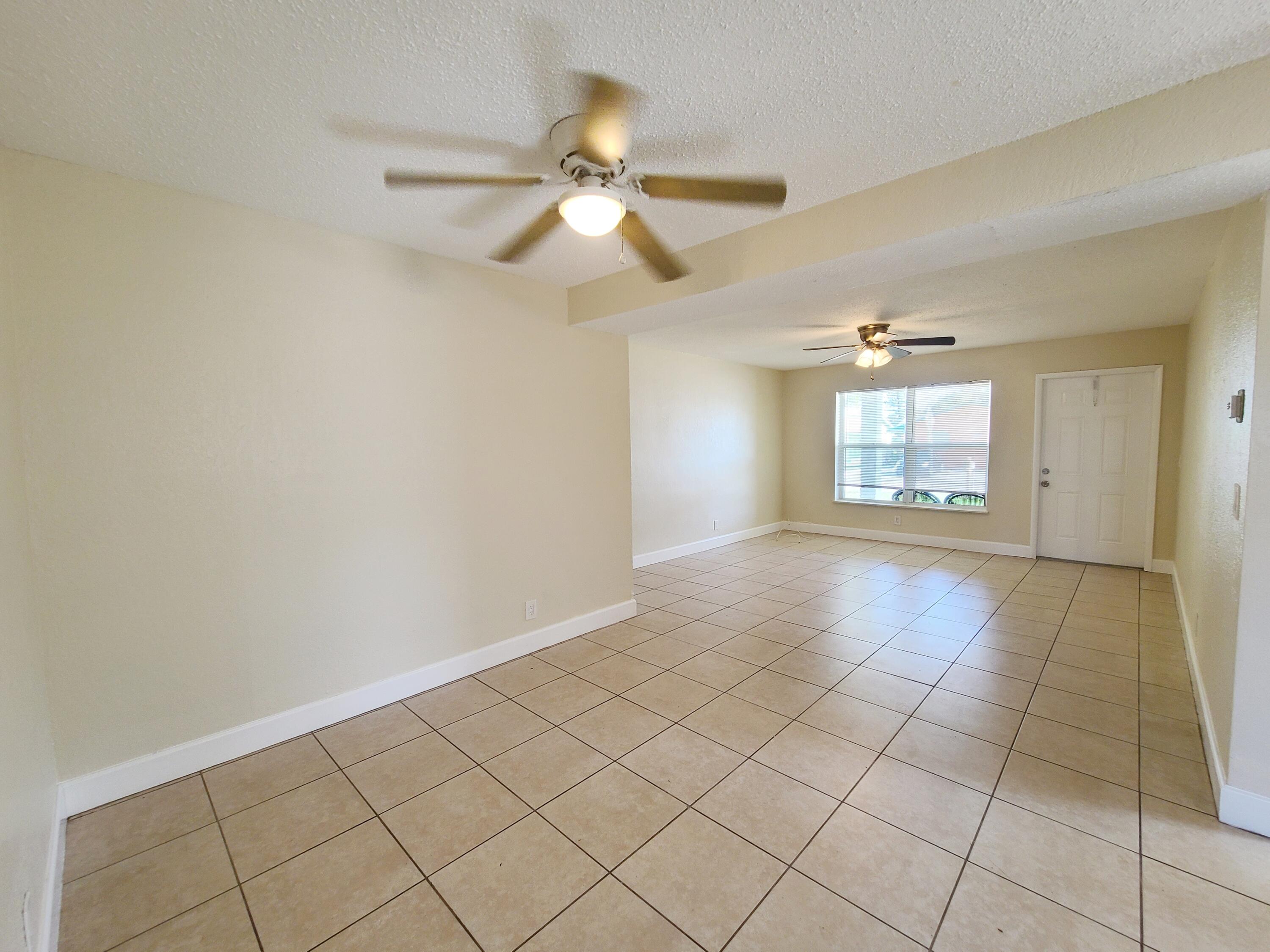 146 West 17th Street Riviera Beach, FL 33404 - Photo 5 of 18 Dining Room/Living Room