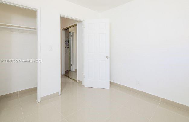 309 Phippen Waiters Road, Unit 1 Dania Beach, FL 33004 - Photo 8 of 8 a view of an empty room