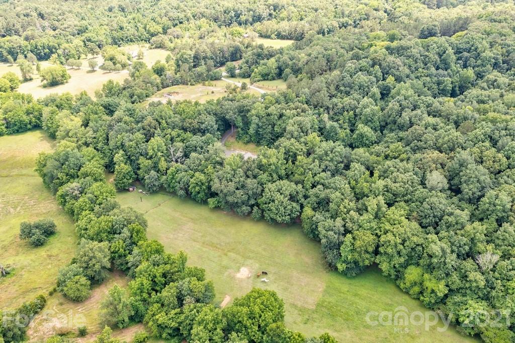 a view of a lake with a yard