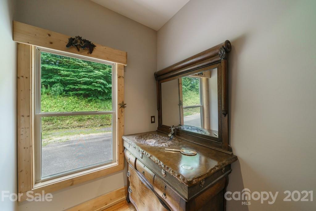 1094 West End Road Chester, SC 29706 - Photo 13 of 37 a living room with a table and a large window