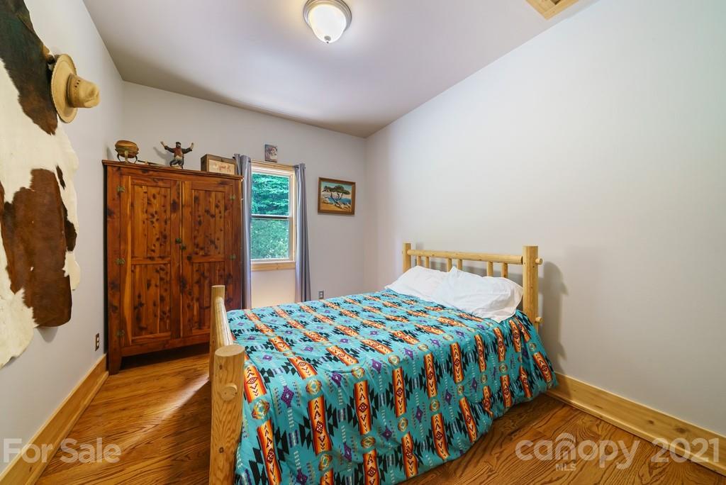 1094 West End Road Chester, SC 29706 - Photo 15 of 37 a bedroom with a bed and a walk in closet