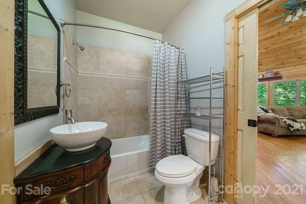 1094 West End Road Chester, SC 29706 - Photo 16 of 37 a bathroom with a sink toilet and shower
