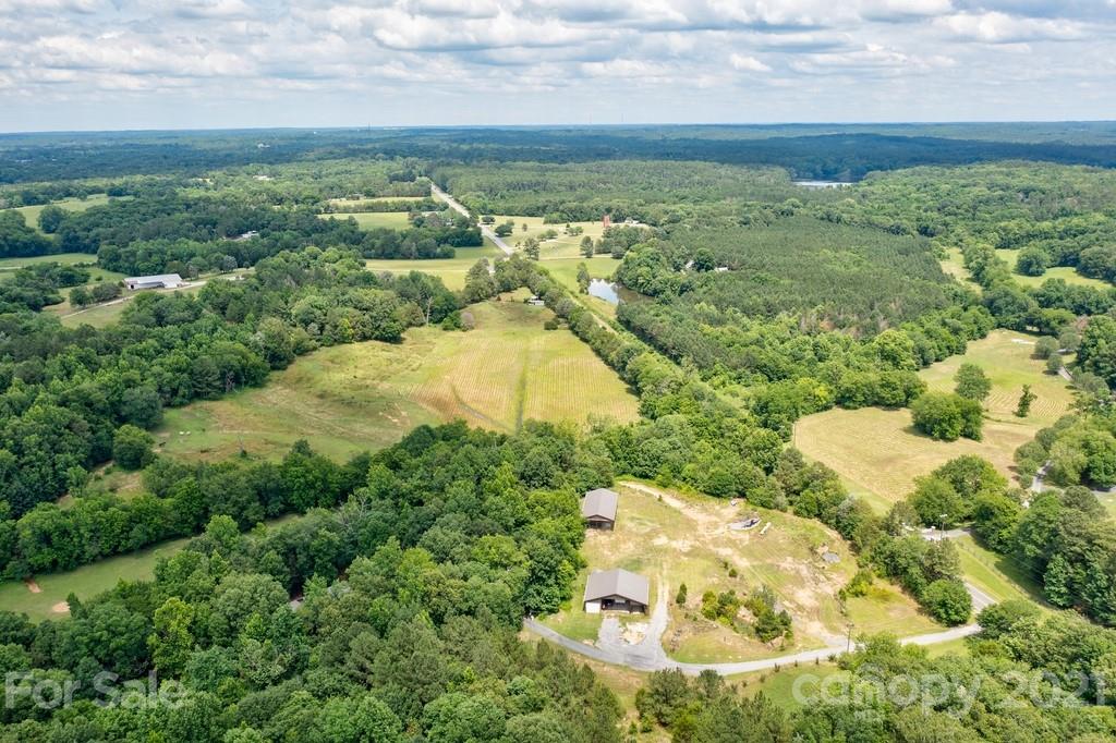 1094 West End Road Chester, SC 29706 - Photo 21 of 37 an aerial view of a houses with outdoor space and trees all around