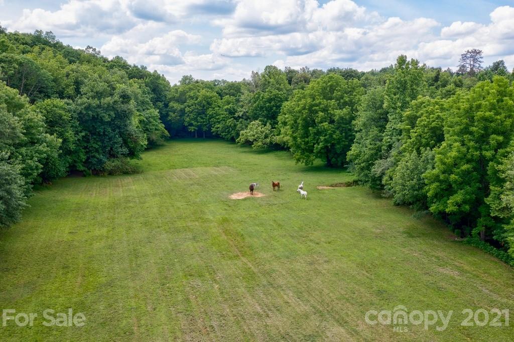 1094 West End Road Chester, SC 29706 - Photo 36 of 37 a view of a green field with clear sky