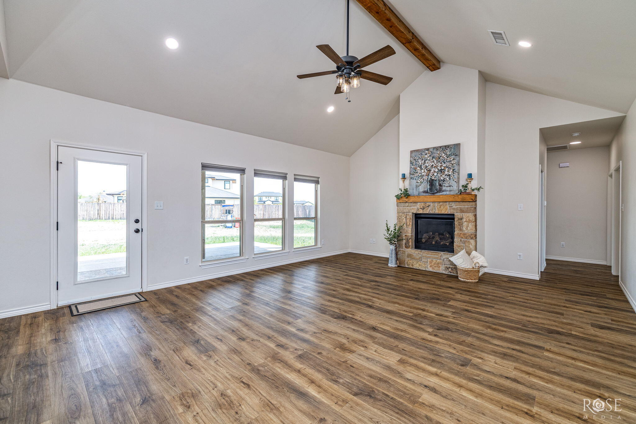 1938 Beaty Road San Angelo, TX 76904 - Photo 4 of 45 Living area with nice stone fireplace with gas logs.