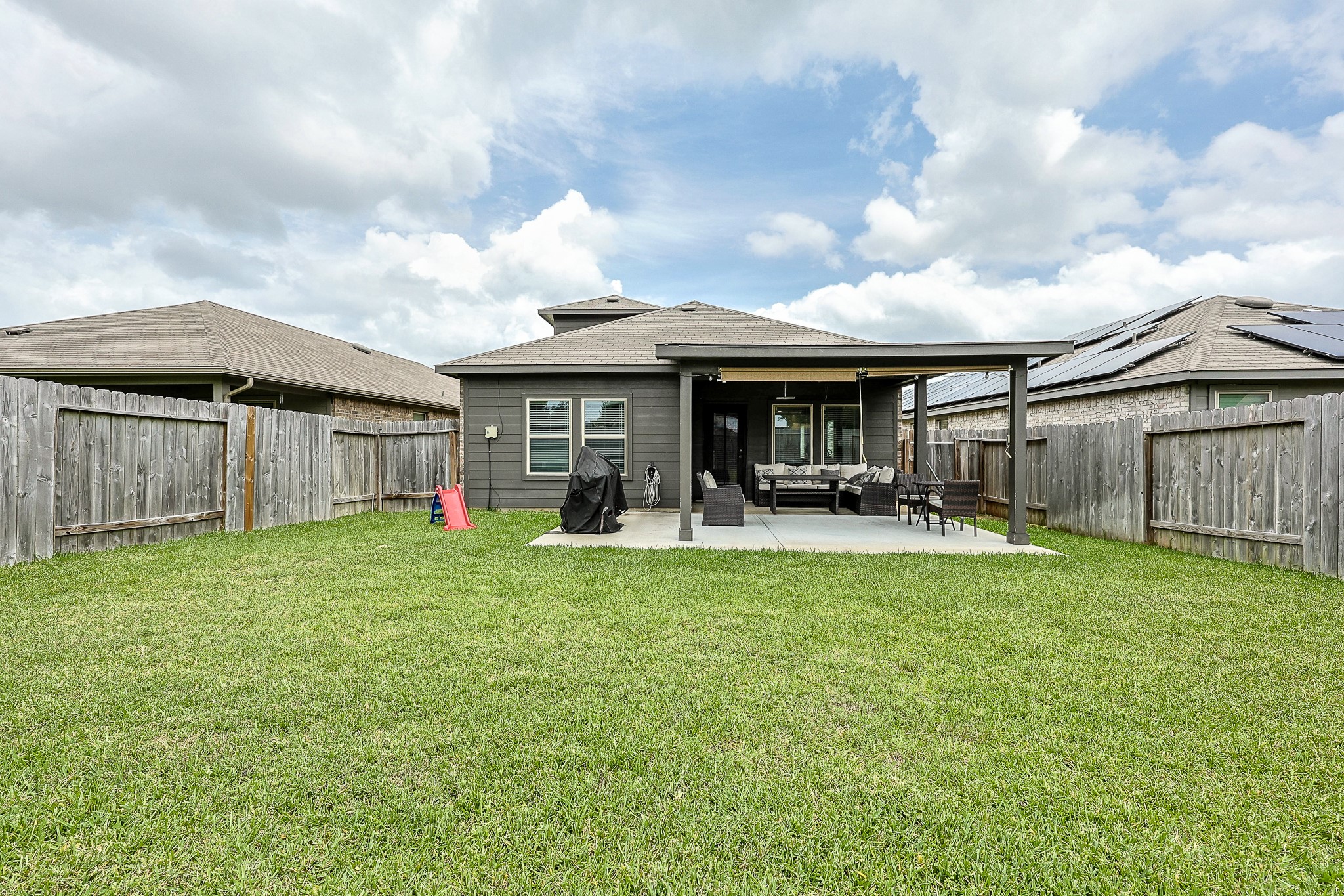 22603 Aspen Tarn Trail Spring, TX 77373 - Photo 19 of 20 a view of a house with backyard porch and garden