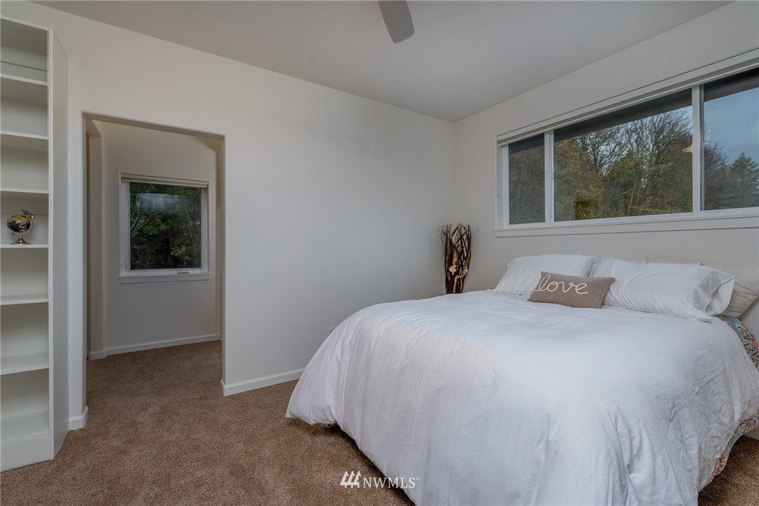 672 East Smith Road Bellingham, WA 98226 - Photo 12 of 25 a bedroom with a bed and a window
