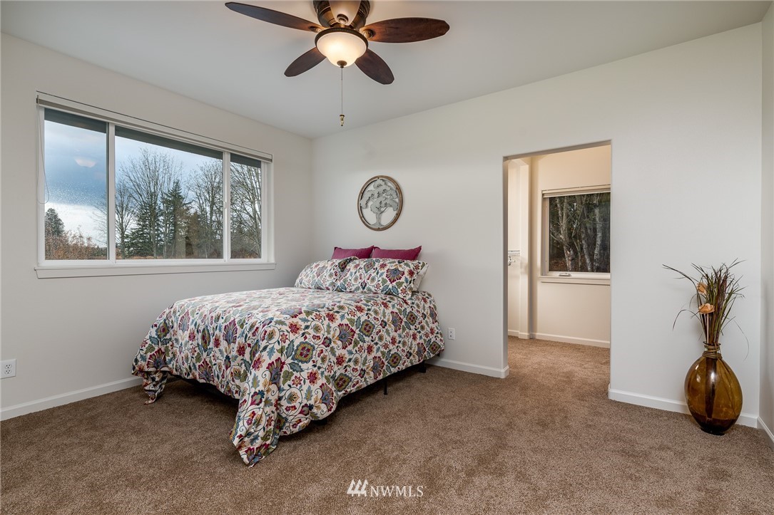672 East Smith Road Bellingham, WA 98226 - Photo 14 of 25 a bedroom with a bed and window