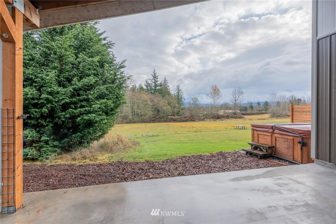672 East Smith Road Bellingham, WA 98226 - Photo 18 of 25 a view of a lake with a big yard