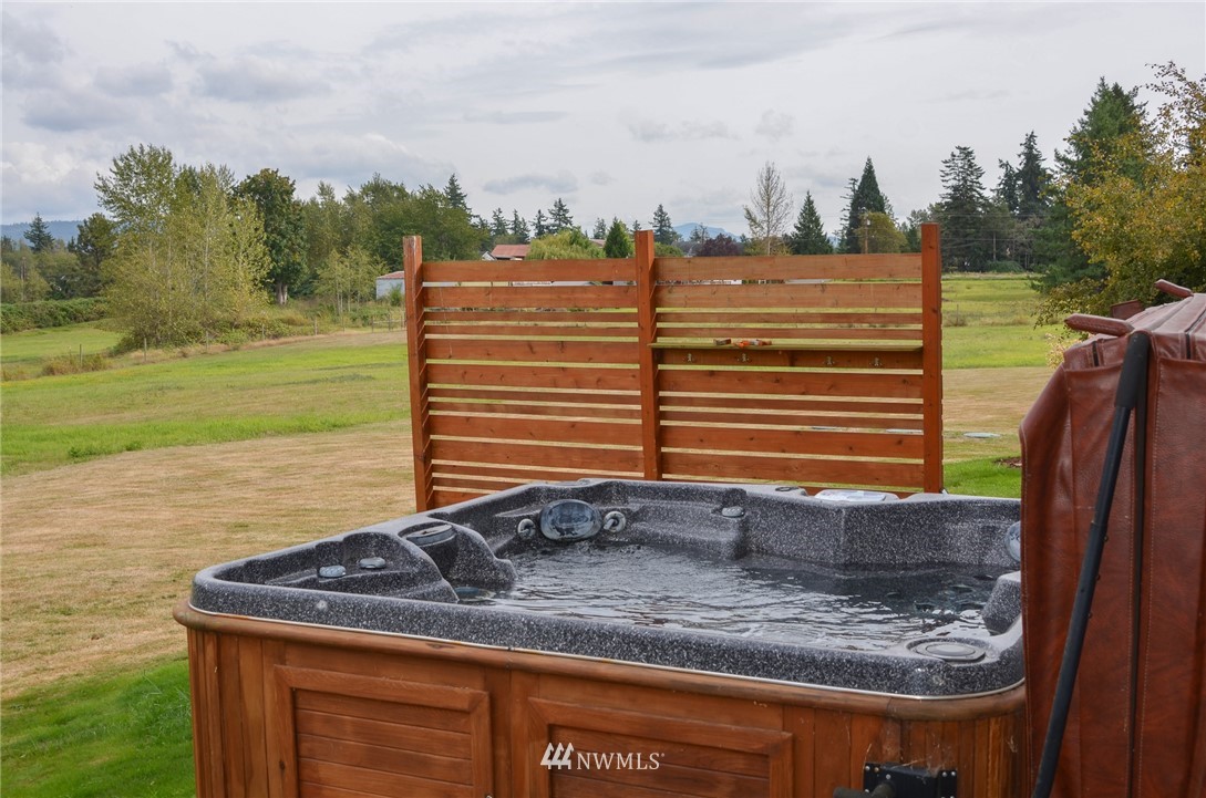 672 East Smith Road Bellingham, WA 98226 - Photo 19 of 25 a view of a yard with a sink and floor to ceiling window