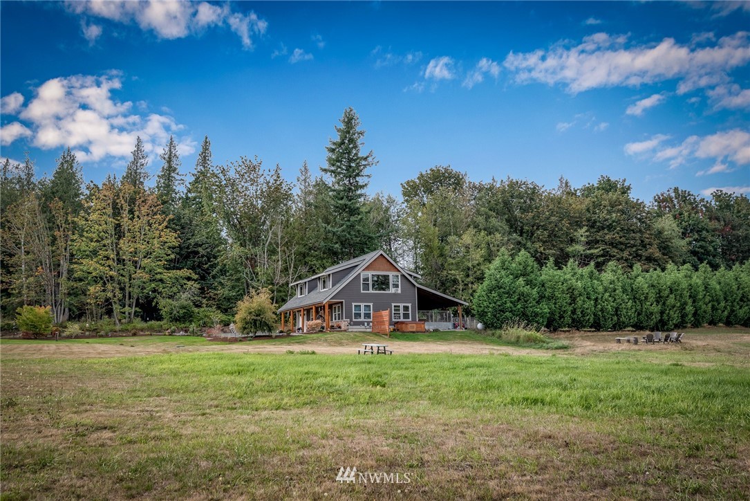672 East Smith Road Bellingham, WA 98226 - Photo 21 of 25 a front view of a house with garden