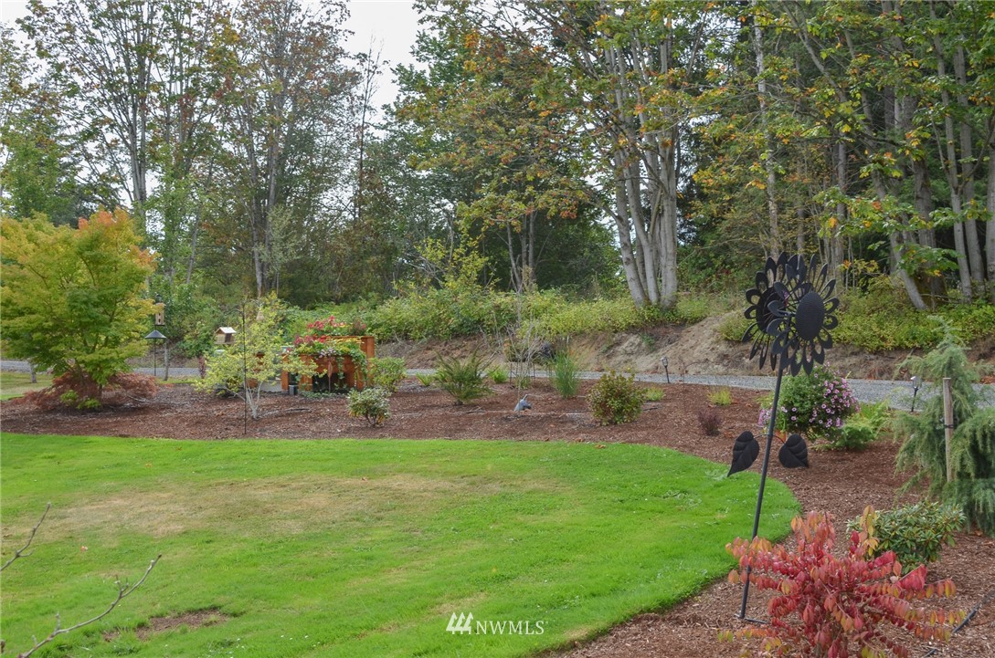 672 East Smith Road Bellingham, WA 98226 - Photo 22 of 25 a view of a garden with trees