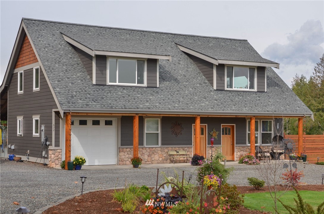 672 East Smith Road Bellingham, WA 98226 - Photo 23 of 25 a front view of a house with garden
