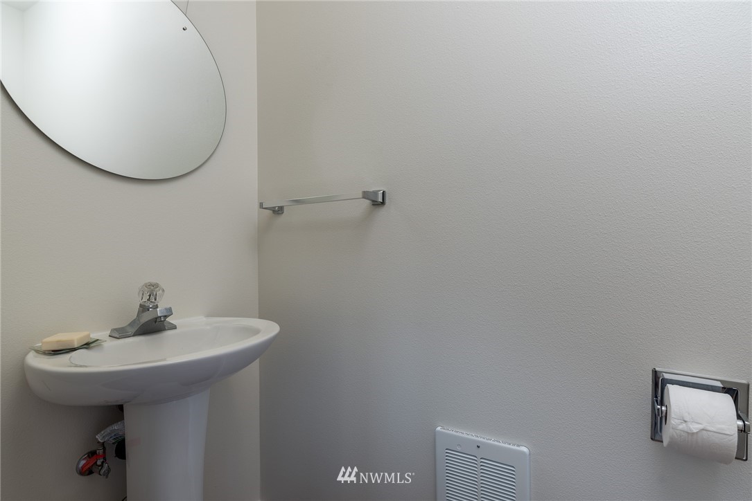 672 East Smith Road Bellingham, WA 98226 - Photo 7 of 25 a bathroom with a sink and mirror