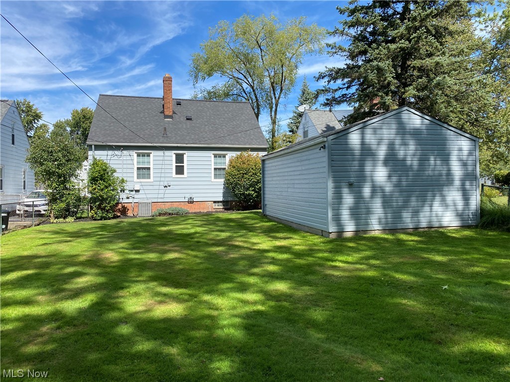 5680 Shawnee Road Cleveland, OH 44124 - Photo 20 of 21 View of yard with central air condition unit