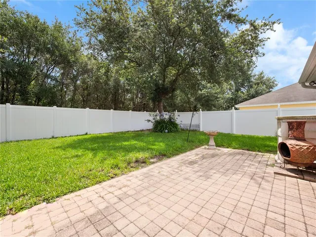 a view of backyard with green space