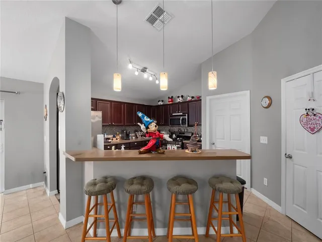 a view of a dining room and chairs