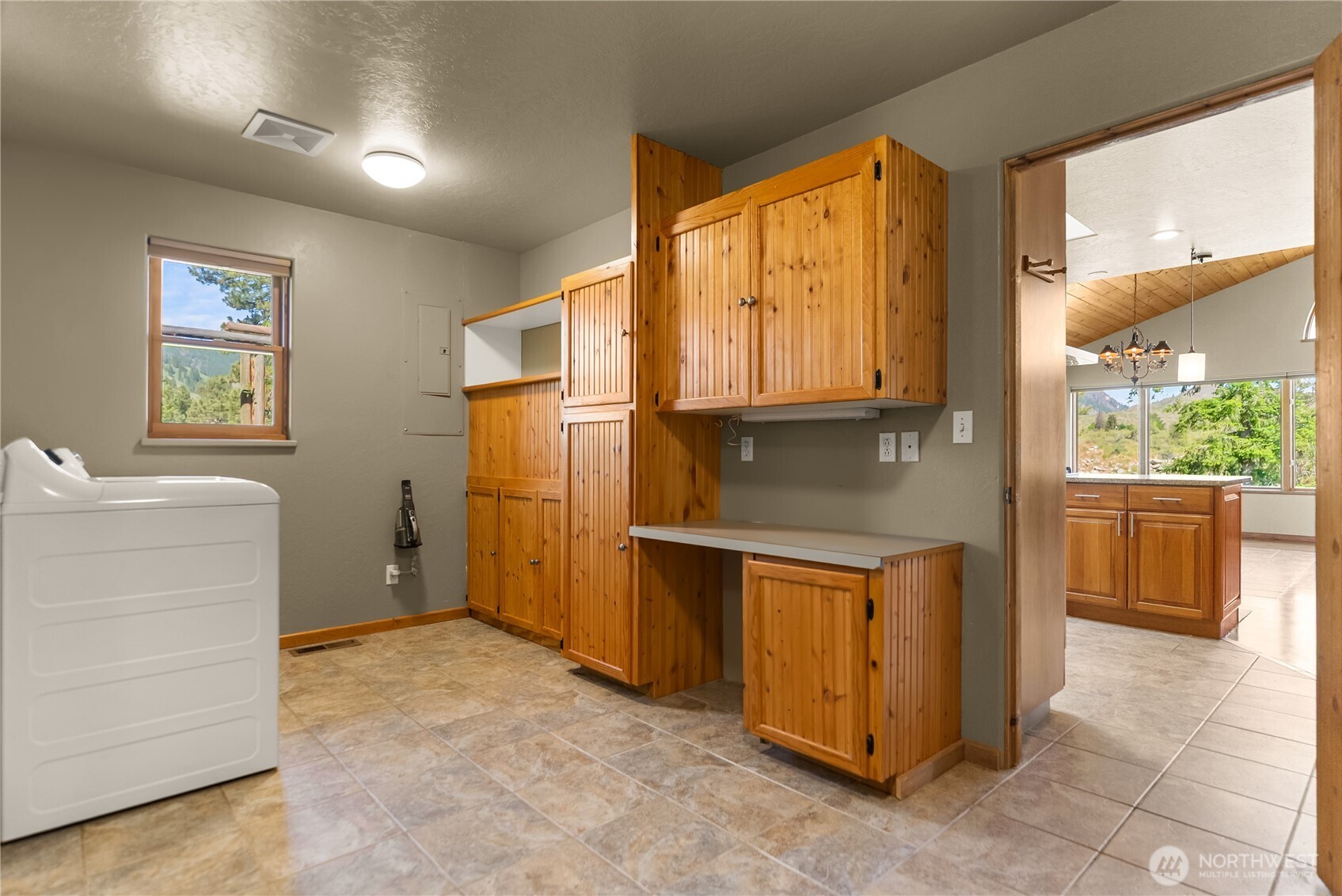 2621 Highway 153 Twisp, WA 98856 - Photo 29 of 40 a kitchen with a stove a refrigerator and cabinets