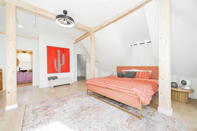 a bed room with a bed and a walk in closet