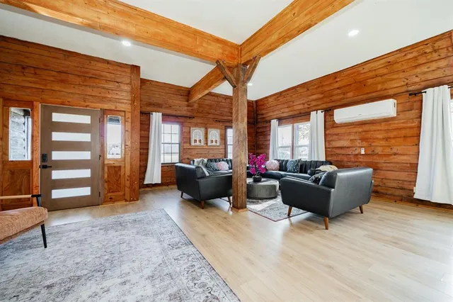 a view of a livingroom with furniture and window