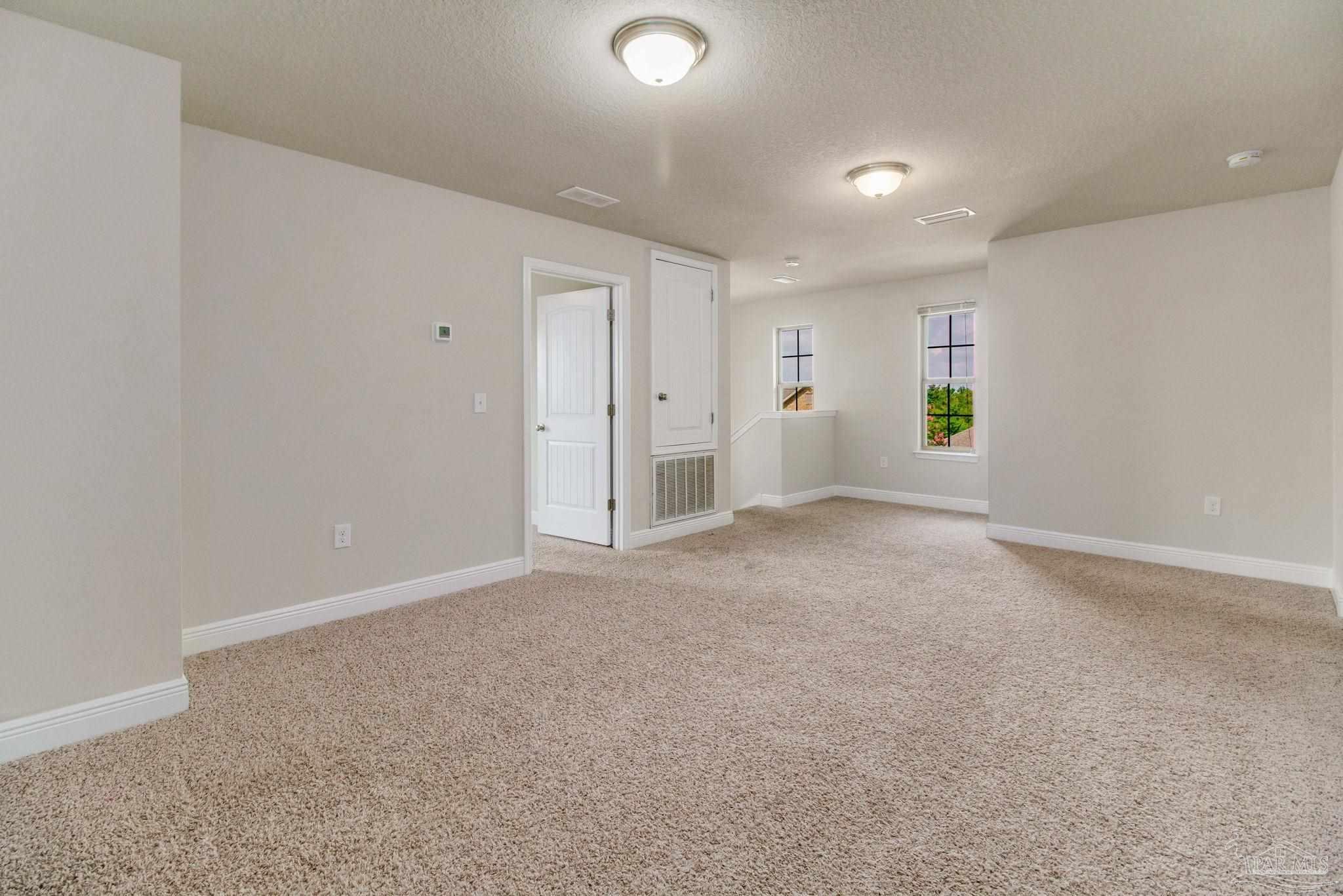 6348 Ladera Trail Pace, FL 32571 - Photo 26 of 50 a view of an empty room