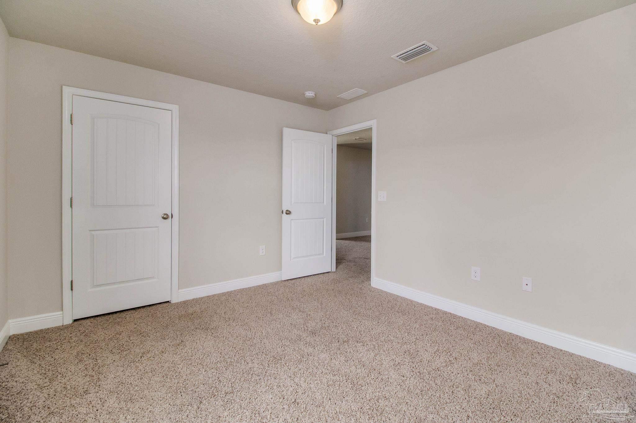 6348 Ladera Trail Pace, FL 32571 - Photo 38 of 50 a view of an empty room and a window