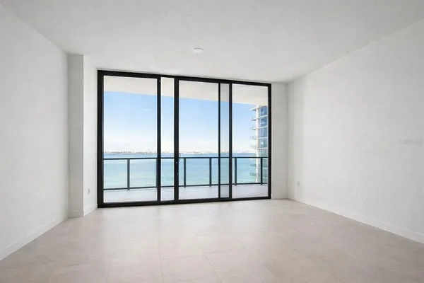 a view of a building with floor to ceiling windows