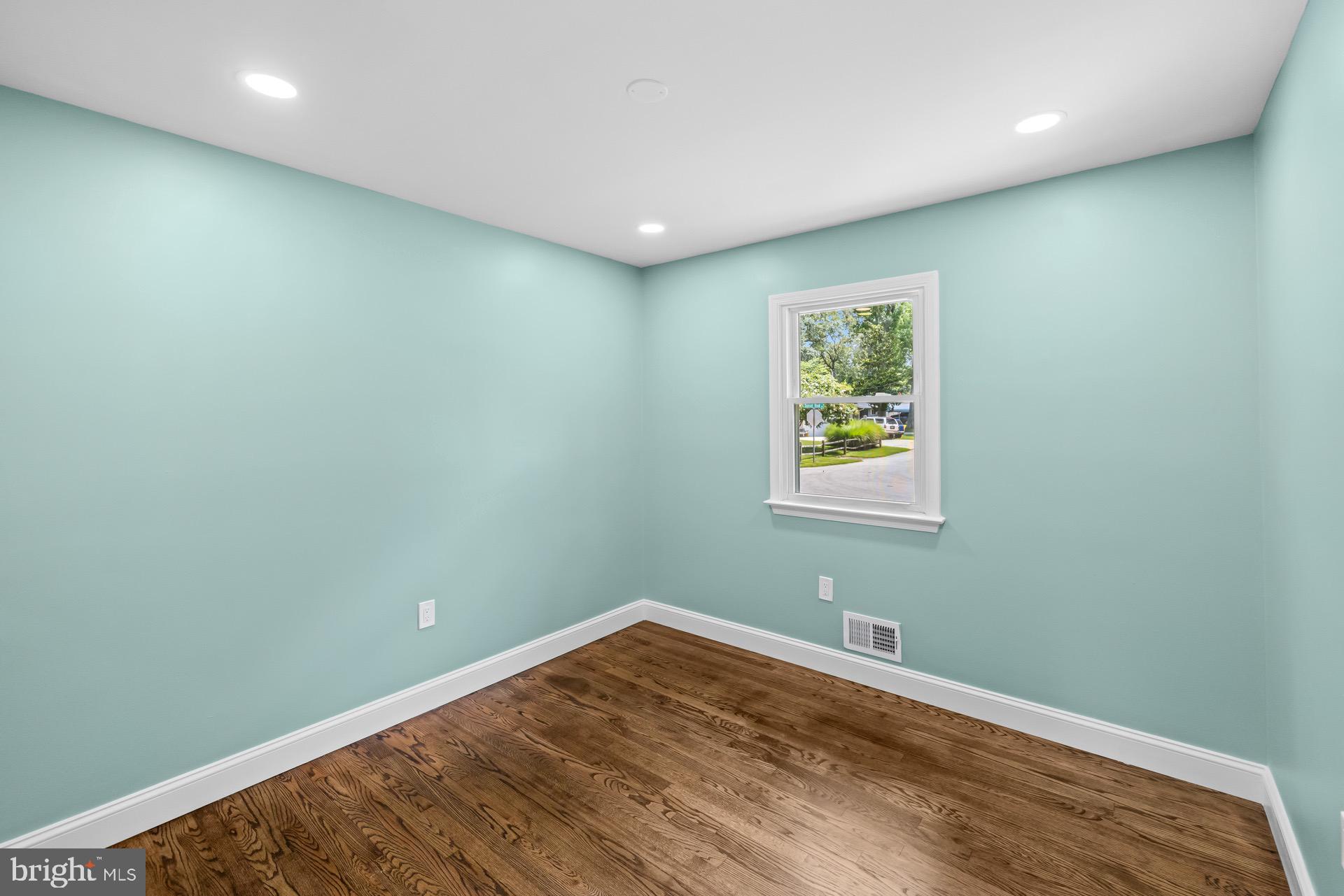 523 Sunset Knoll Road Pasadena, MD 21122 - Photo 28 of 60 a view of room with window and hardwood floor