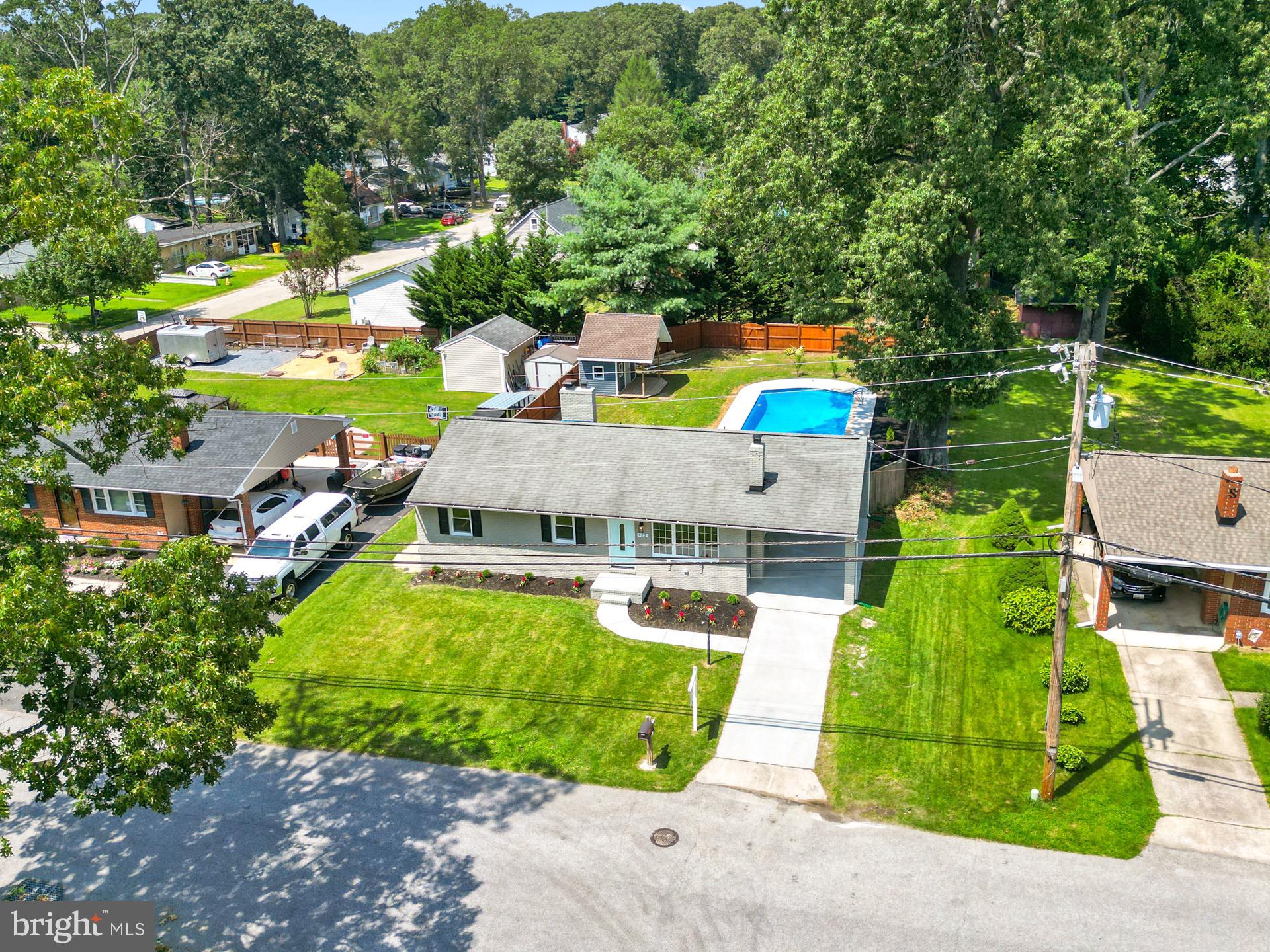 523 Sunset Knoll Road Pasadena, MD 21122 - Photo 31 of 60 a view of an outdoor space pool patio and outdoor seating