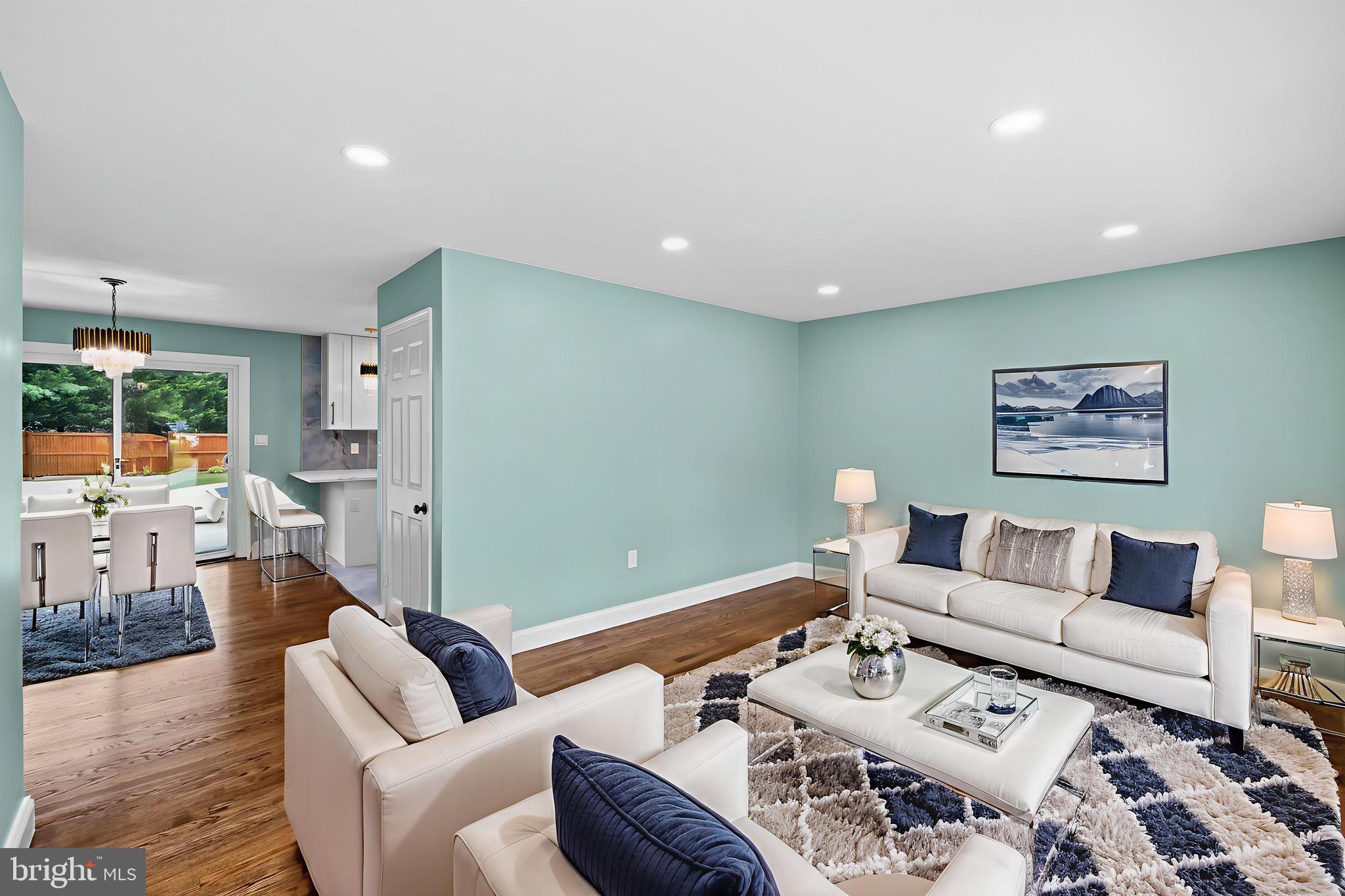 523 Sunset Knoll Road Pasadena, MD 21122 - Photo 4 of 60 a living room with furniture and a wooden floor