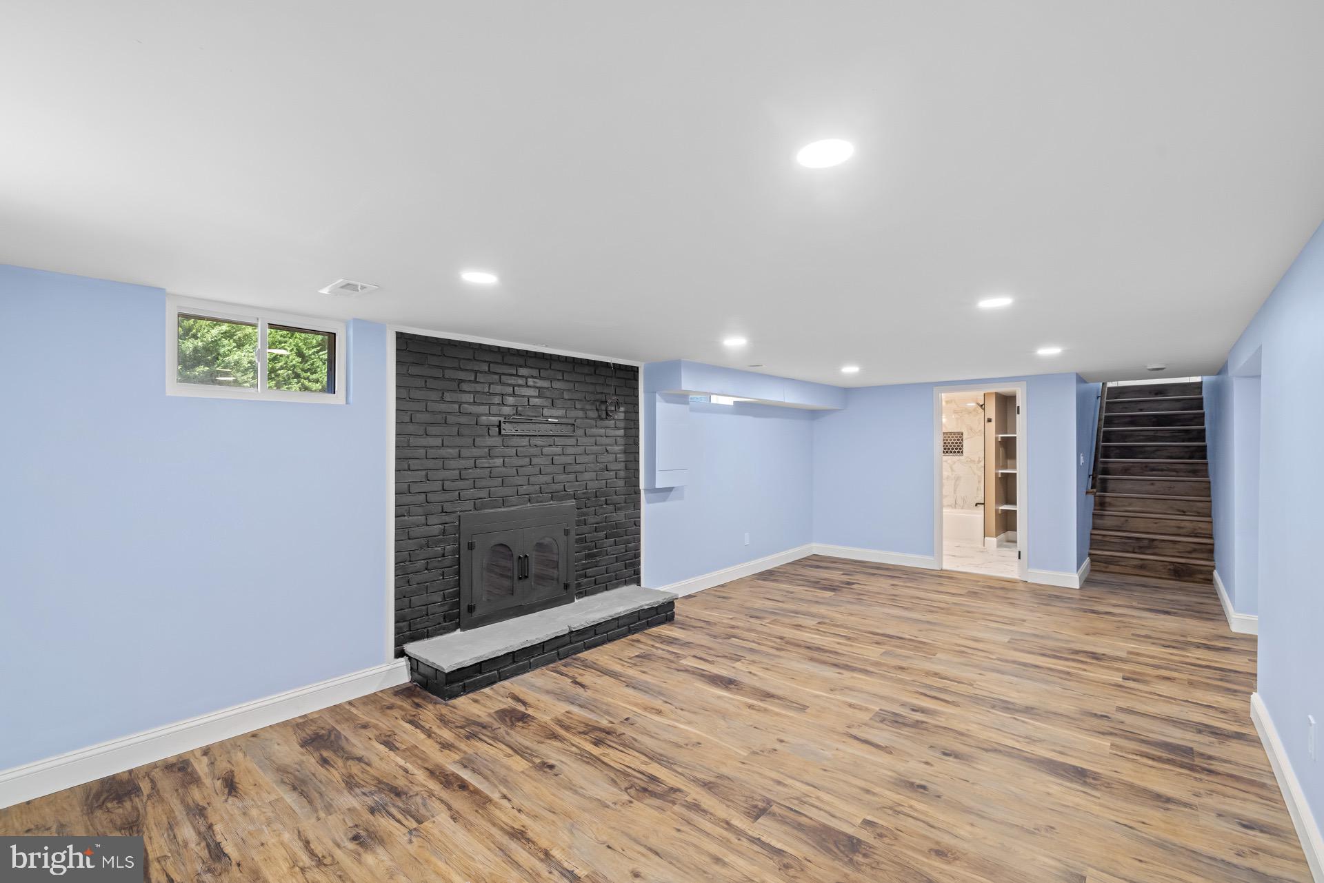 523 Sunset Knoll Road Pasadena, MD 21122 - Photo 44 of 60 a view of an empty room with wooden floor and closet