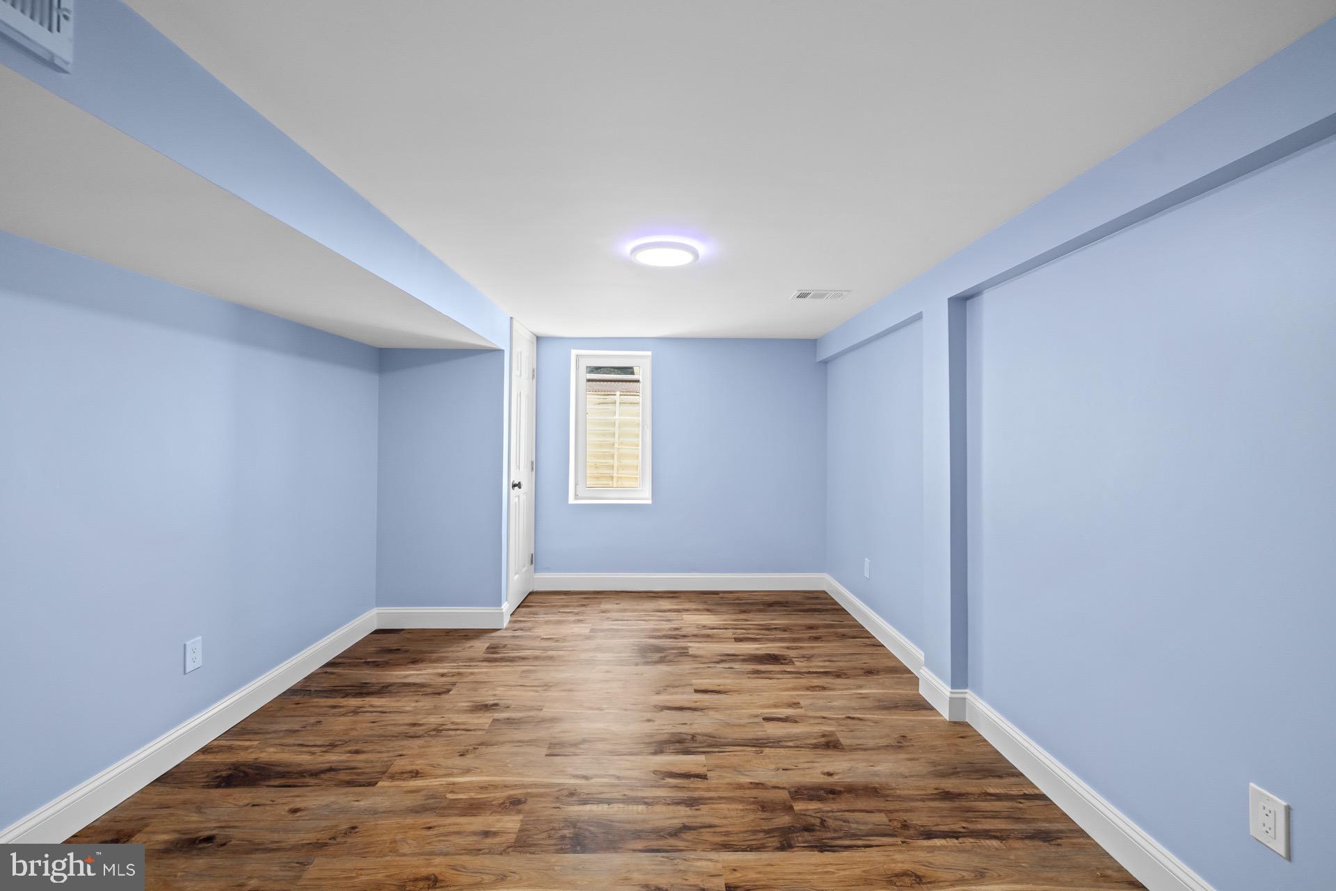 523 Sunset Knoll Road Pasadena, MD 21122 - Photo 48 of 60 a view of an empty room and window
