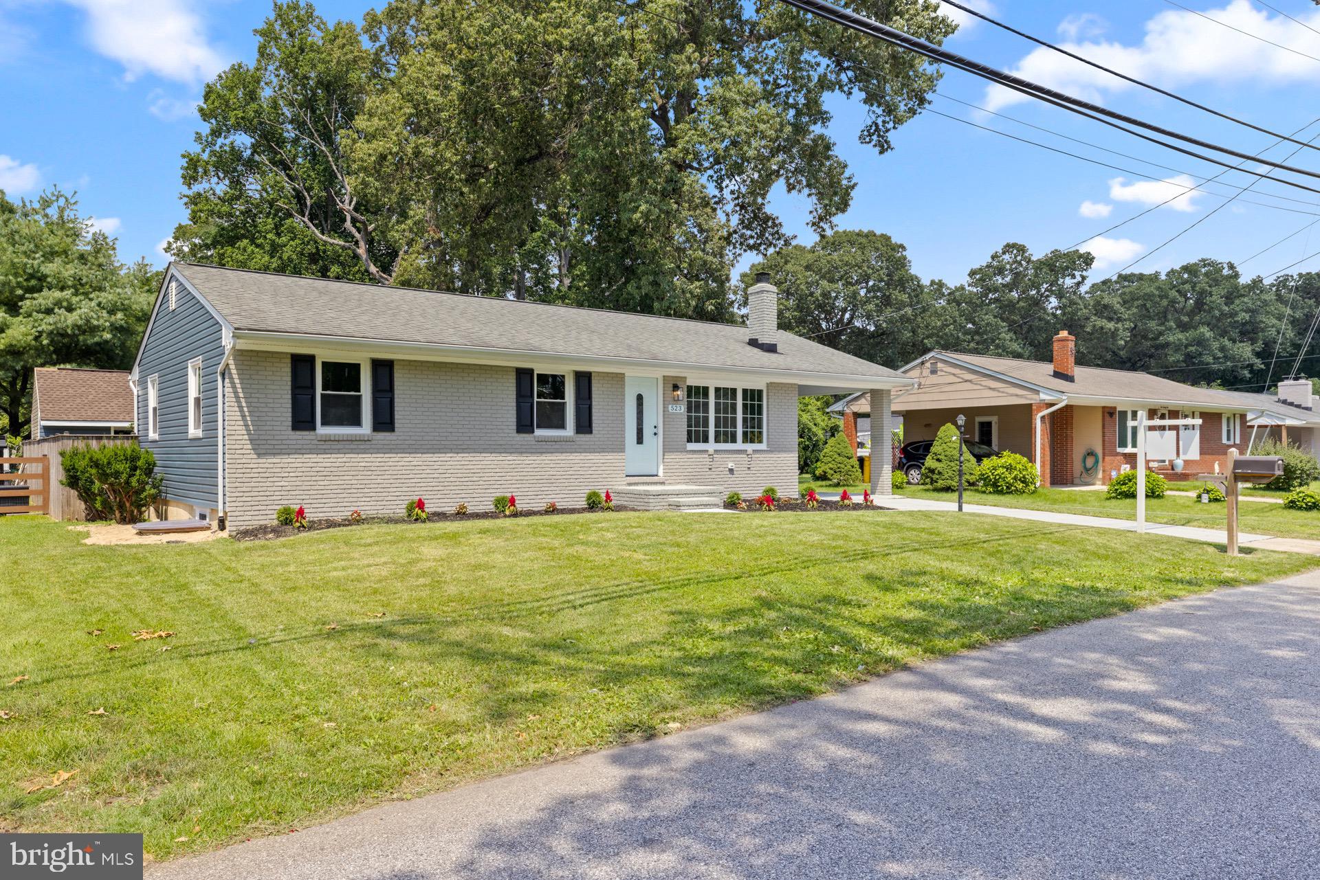 523 Sunset Knoll Road Pasadena, MD 21122 - Photo 60 of 60 a front view of house with yard and green space
