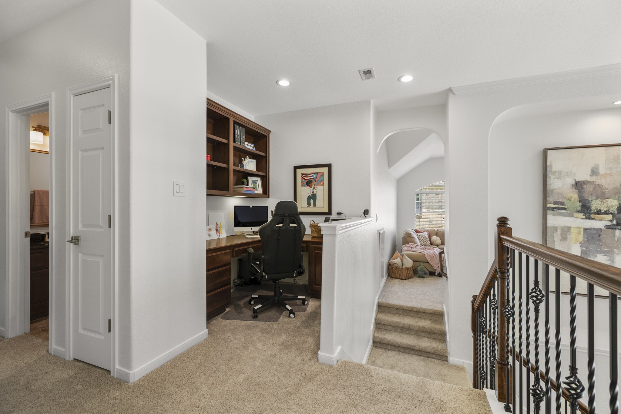 26 Winhall Place The Woodlands, TX 77354 - Photo 28 of 49 a view of a hallway with workspace and closet