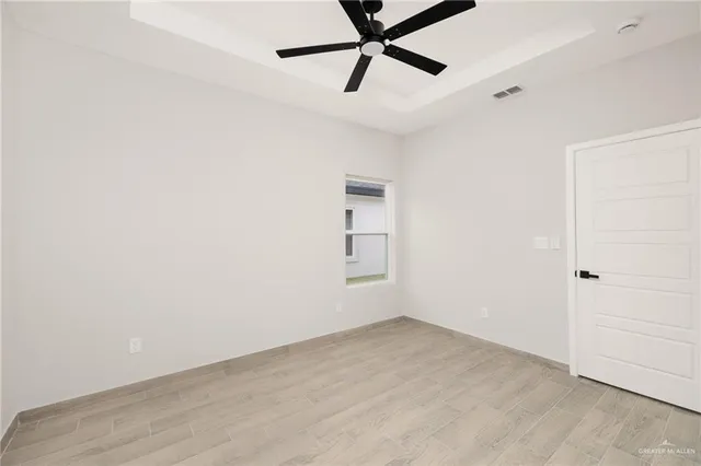 a bathroom with a sink toilet a mirror and shower