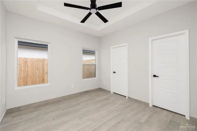 a bathroom with a sink toilet and mirror