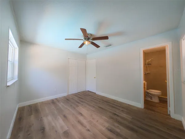a view of a livingroom with a hardwood floor