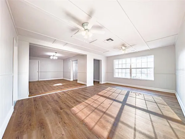 a view of an empty room and window