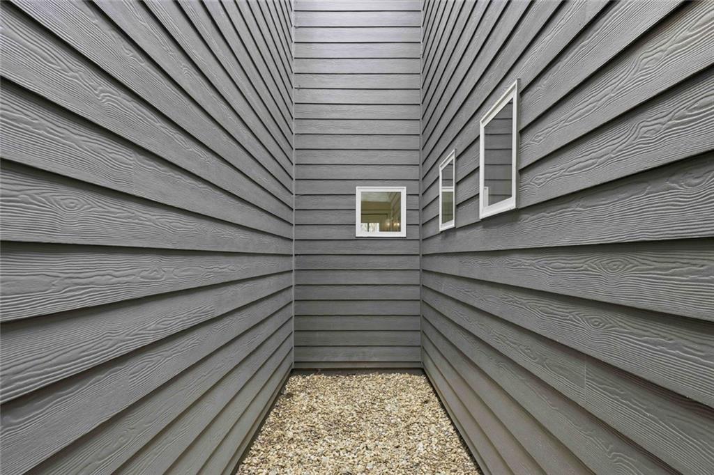 501 Ridge View Crossing Woodstock, GA 30188 - Photo 14 of 44 a house view with a backyard