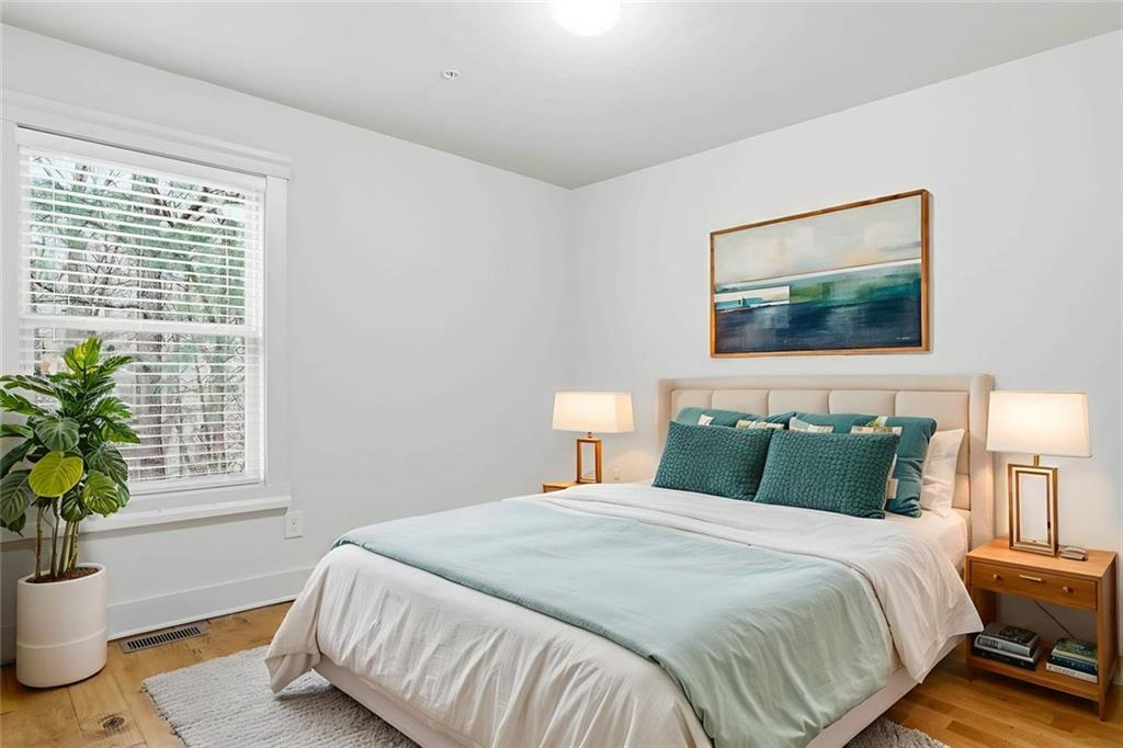 501 Ridge View Crossing Woodstock, GA 30188 - Photo 16 of 44 a bedroom with a bed and a window