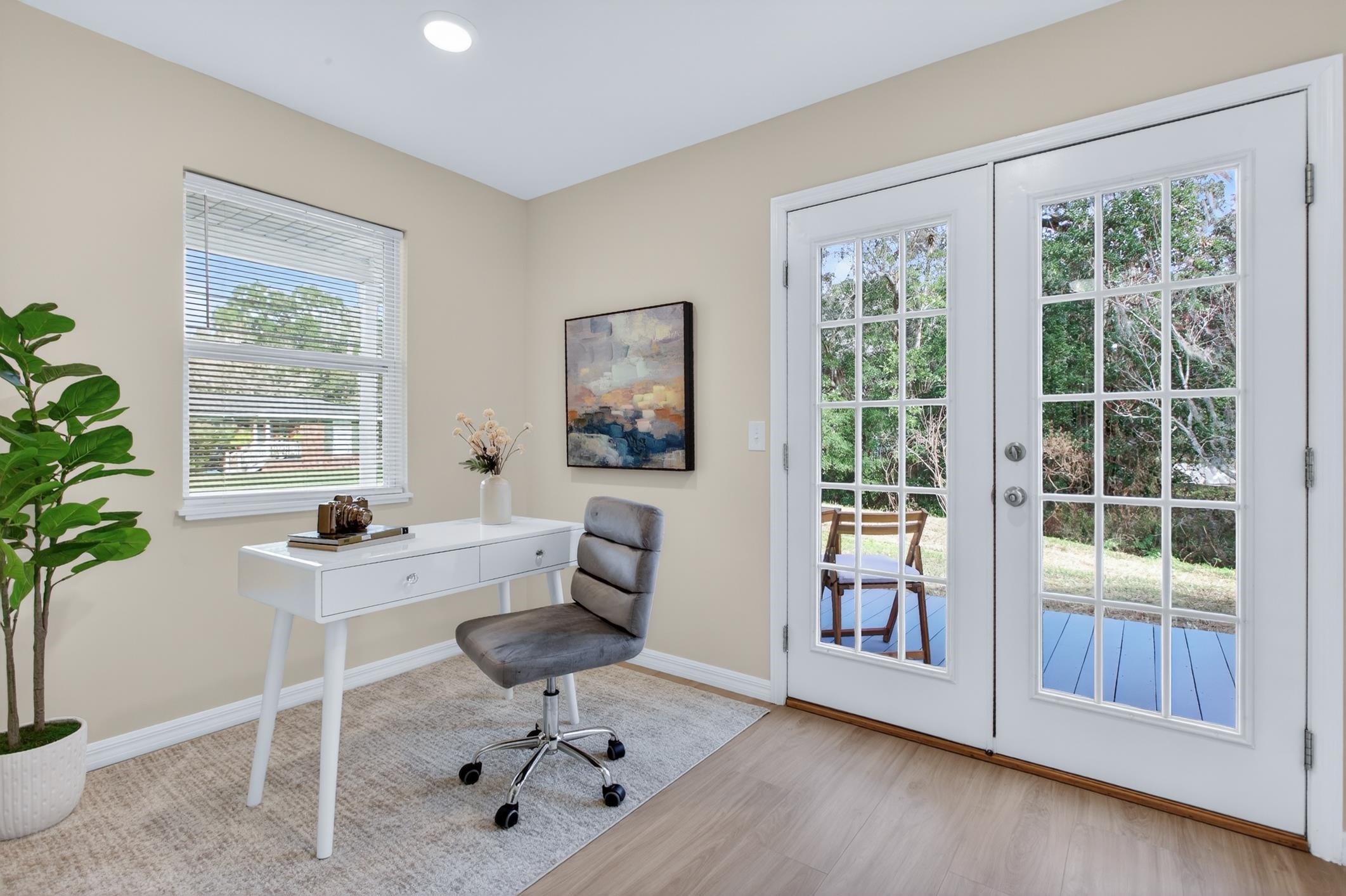 37 Madeore Street St. Augustine, FL 32084 - Photo 14 of 45 Office featuring french doors and light vinyl plank flooring.