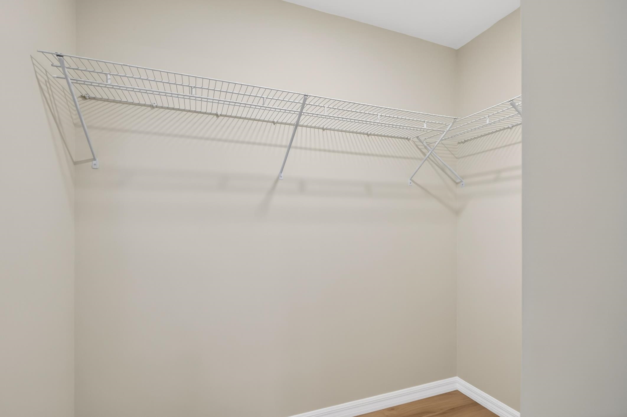 37 Madeore Street St. Augustine, FL 32084 - Photo 29 of 45 Walk-in closet with light vinyl plank flooring