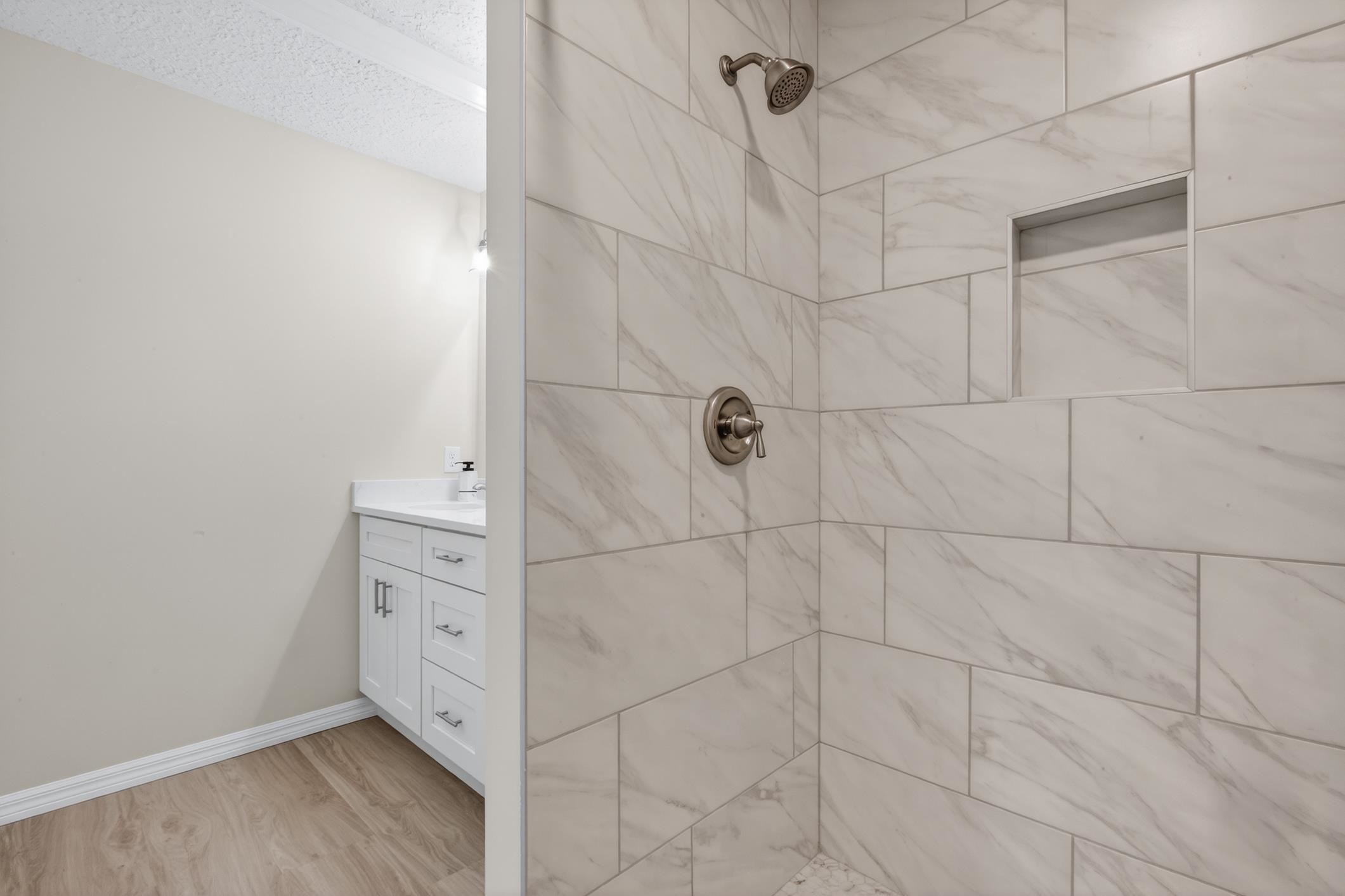 37 Madeore Street St. Augustine, FL 32084 - Photo 33 of 45 Primary bathroom tiled shower.