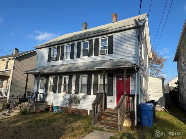 a front view of a house with a porch