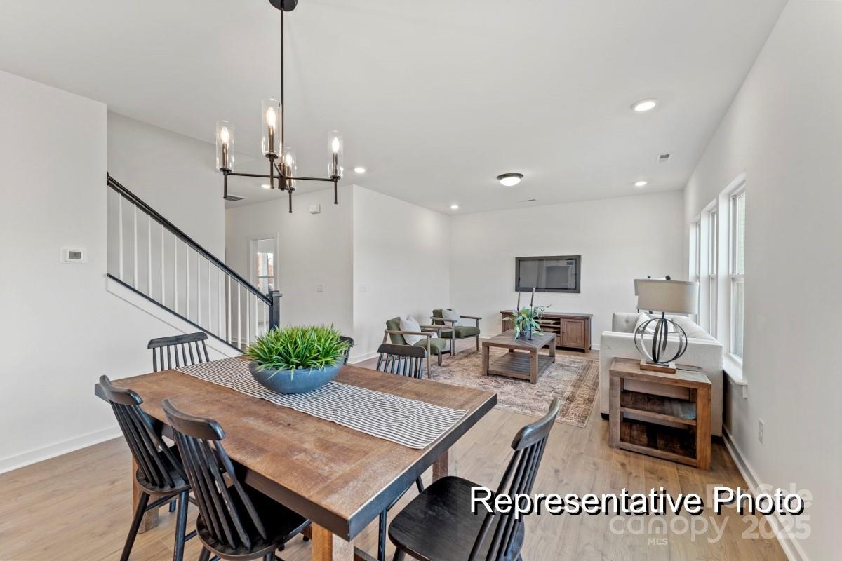 32612 B Millingport Road, Unit 7157 New London, NC 28127 - Photo 9 of 23 a view of a dining room with furniture