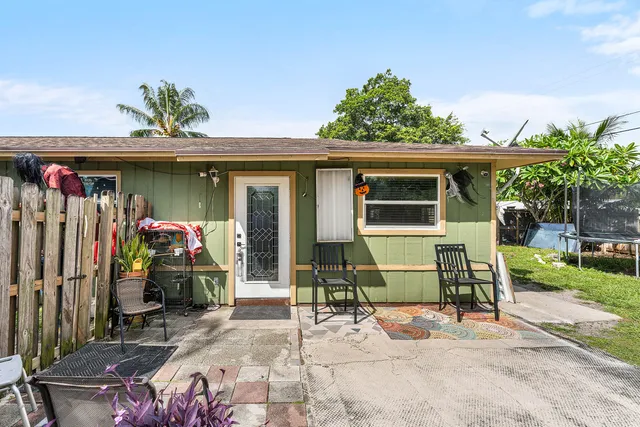 a front view of a house with patio