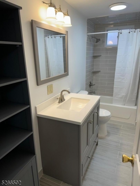 158 Lafayette Street, Unit 2 Newark, NJ 07105 - Photo 5 of 16 a bathroom with a sink and a mirror