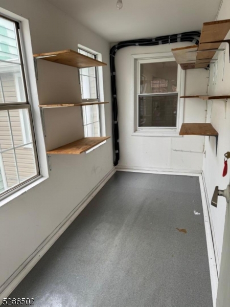 158 Lafayette Street, Unit 2 Newark, NJ 07105 - Photo 7 of 16 a view of an empty room with a window