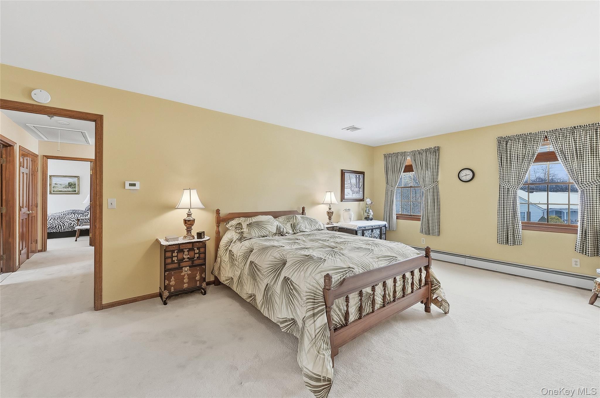 183 High Meadows Road Walden, NY 12586 - Photo 23 of 44 Bedroom with carpet, baseboard heating, and attic access