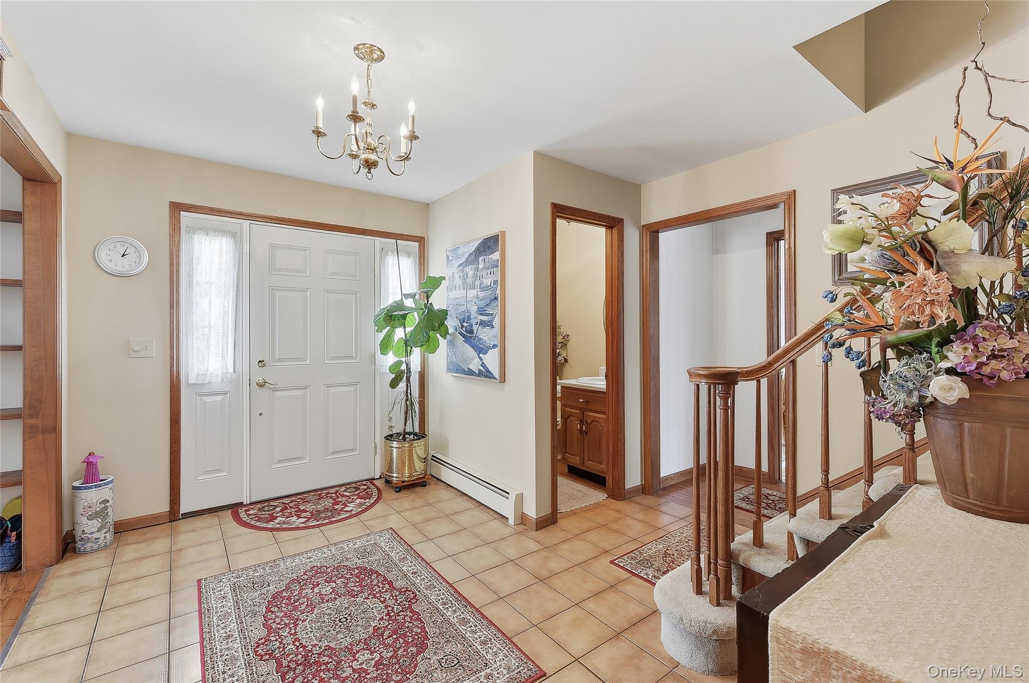 183 High Meadows Road Walden, NY 12586 - Photo 3 of 44 Entrance foyer featuring a chandelier, and light tile patterned flooring